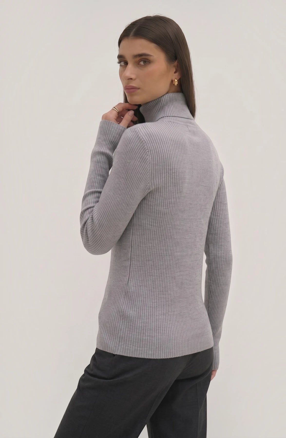 LORVENE Pure Soft Polyester High Neck top in neutral color, close-up view showing smooth fabric and high neckline design.