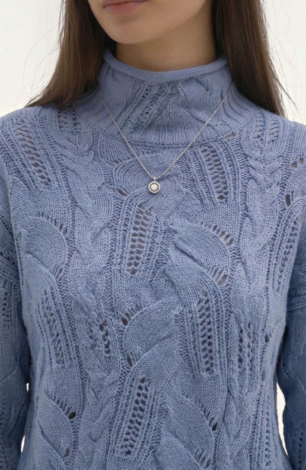 LORVENE lightweight high neck top in soft fabric, shown in a close-up image highlighting the neckline and fabric texture.