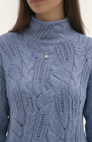 LORVENE lightweight high neck top in soft fabric, shown in a close-up image highlighting the neckline and fabric texture.