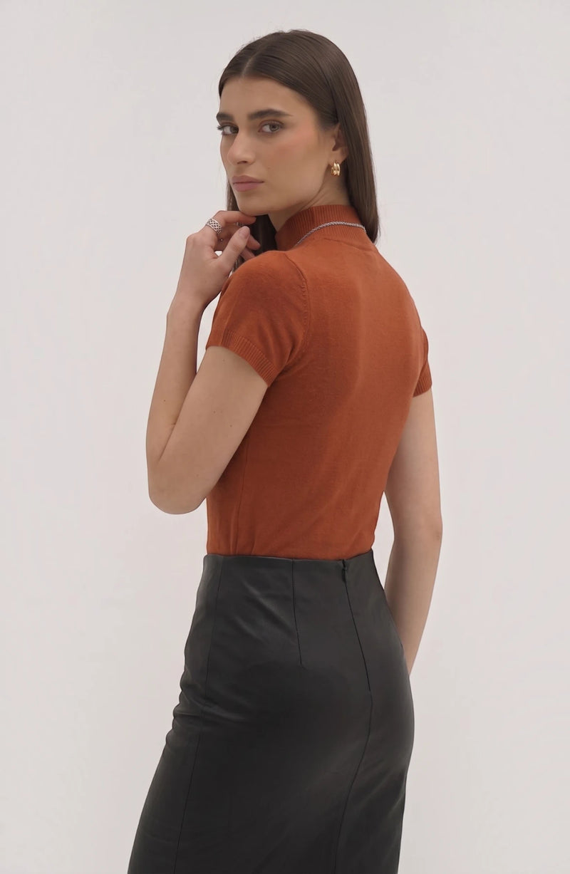 LORVENE Pure Poly Blend High Neck sweater in neutral color, close-up of fabric and high neckline design.
