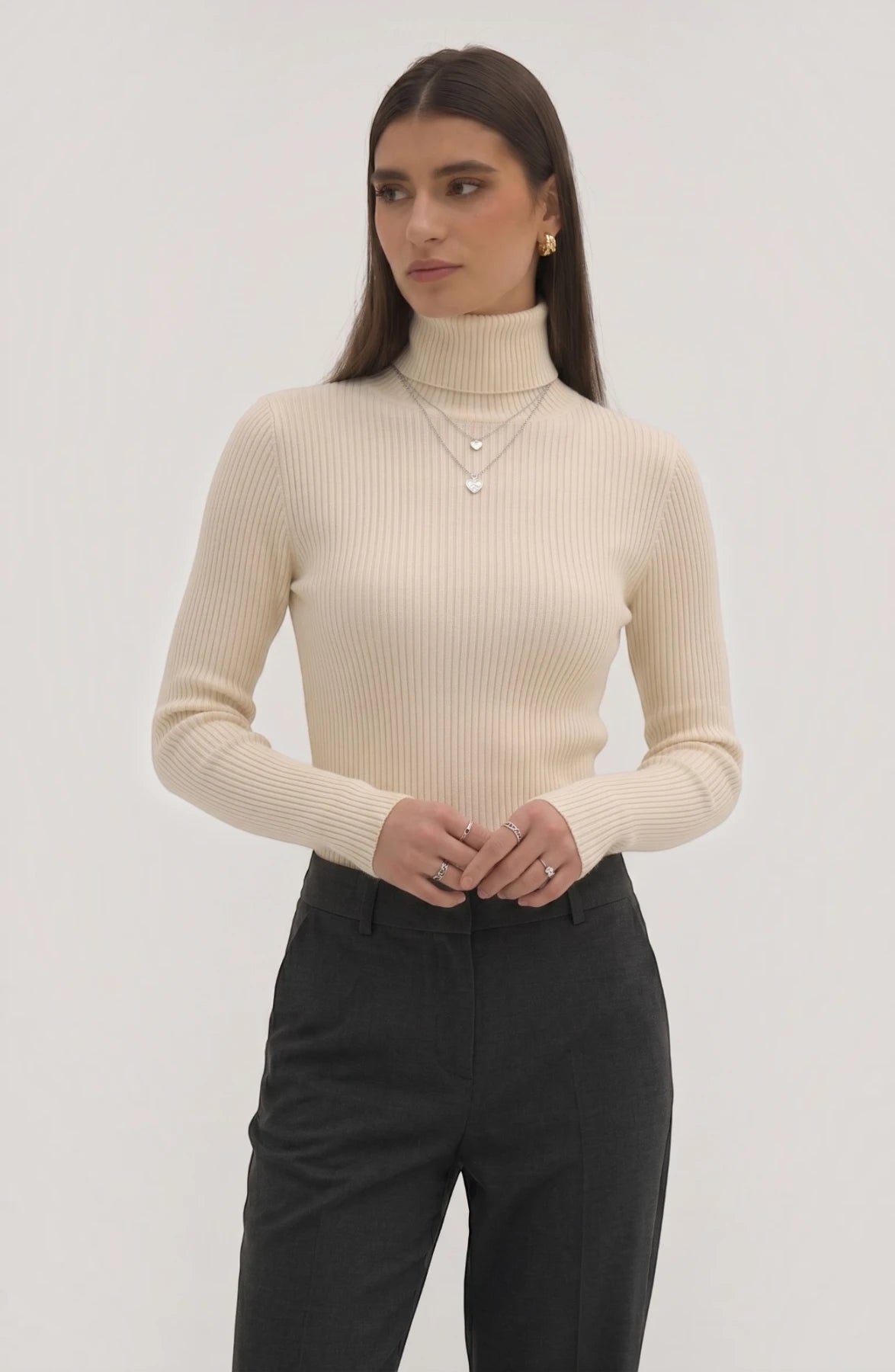 LORVENE Pure Soft Polyester High Neck in neutral color, close-up of the comfortable, smooth fabric and high neckline detail.