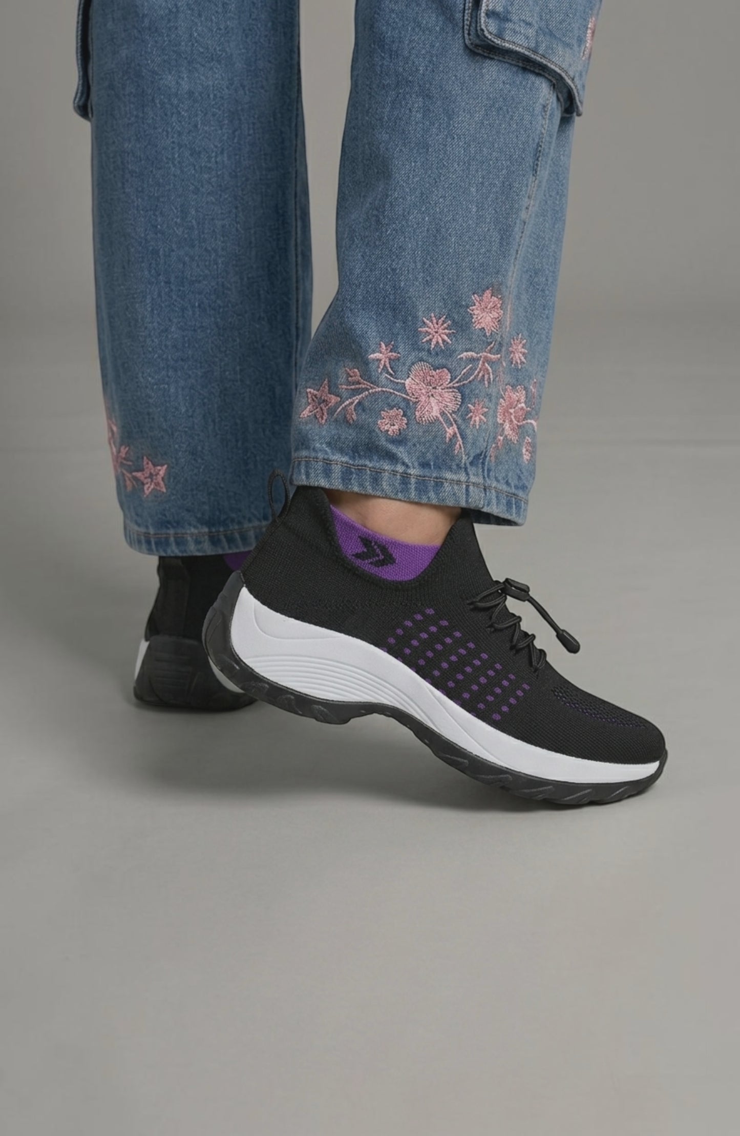 LORVENE Calm Glow sneakers featuring a sleek design and comfortable fit, shown in a close-up view with white and pastel accents.