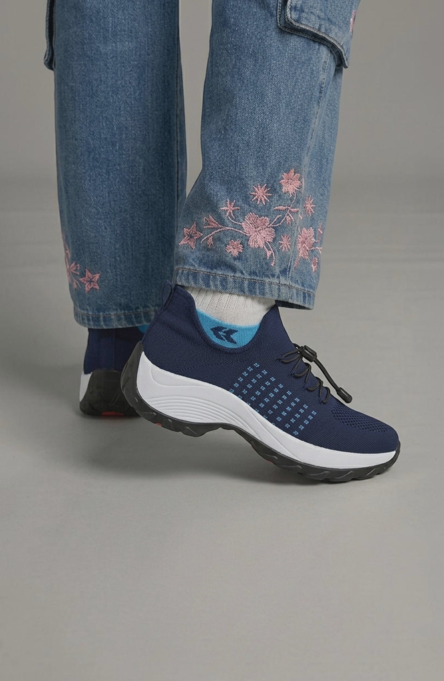 LORVENE Calm Glow sneakers in soft pastel colors, featuring a sleek design and comfortable fit, shown from the top right angle.