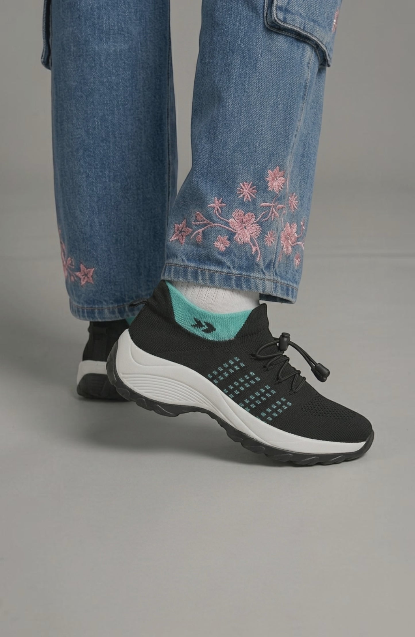 LORVENE Calm Glow sneakers featuring a sleek design, white and pastel color accents, and comfortable athletic style.