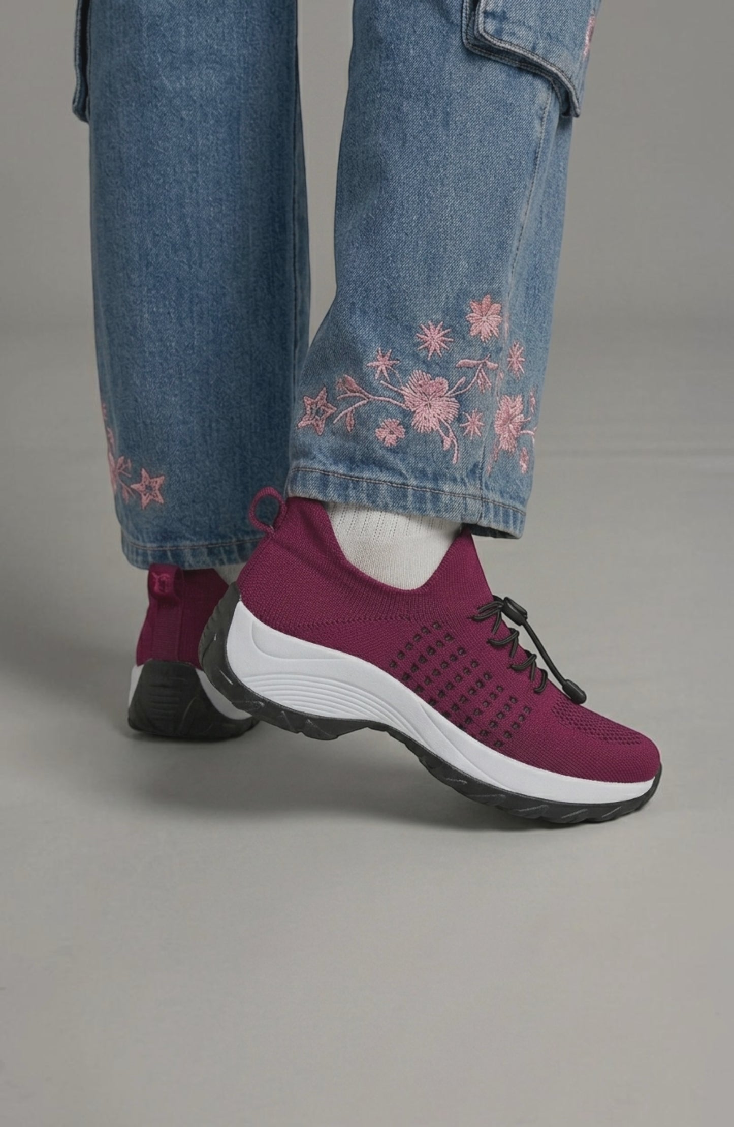 LORVENE Calm Glow sneakers featuring a sleek design, white and pastel accents, and comfortable athletic style.