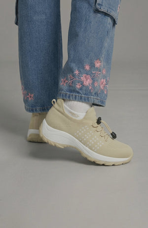 LORVENE Calm Glow sneakers in soft pastel colors with sleek design, displayed on a plain background.