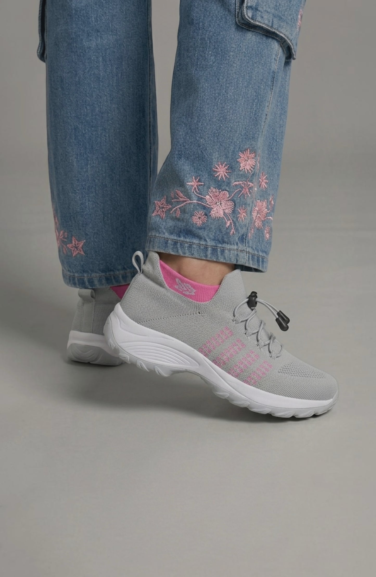 LORVENE Calm Glow sneakers featuring sleek design and comfortable fit, with white and pastel color accents.