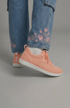 LORVENE Glide Flare Sneakers in white with stylish flare soles, casual athletic design, and lace-up front for comfortable wear.