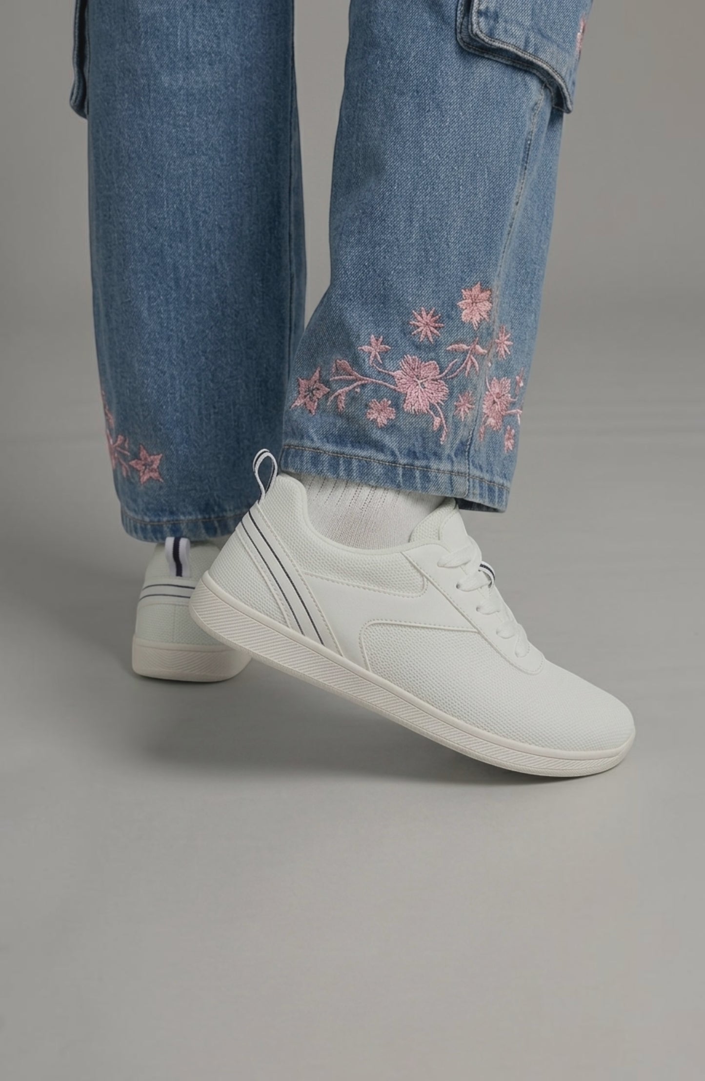 LORVENE Glide Flare Sneakers in white with stylish flare sole and lace-up design, displayed on a neutral background.