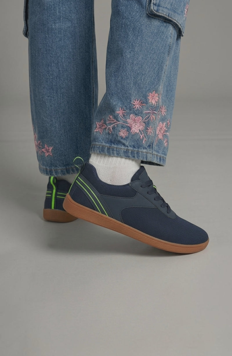 LORVENE Glide Flare Sneakers in white with chunky soles, featuring stylish laces and a modern athletic design.