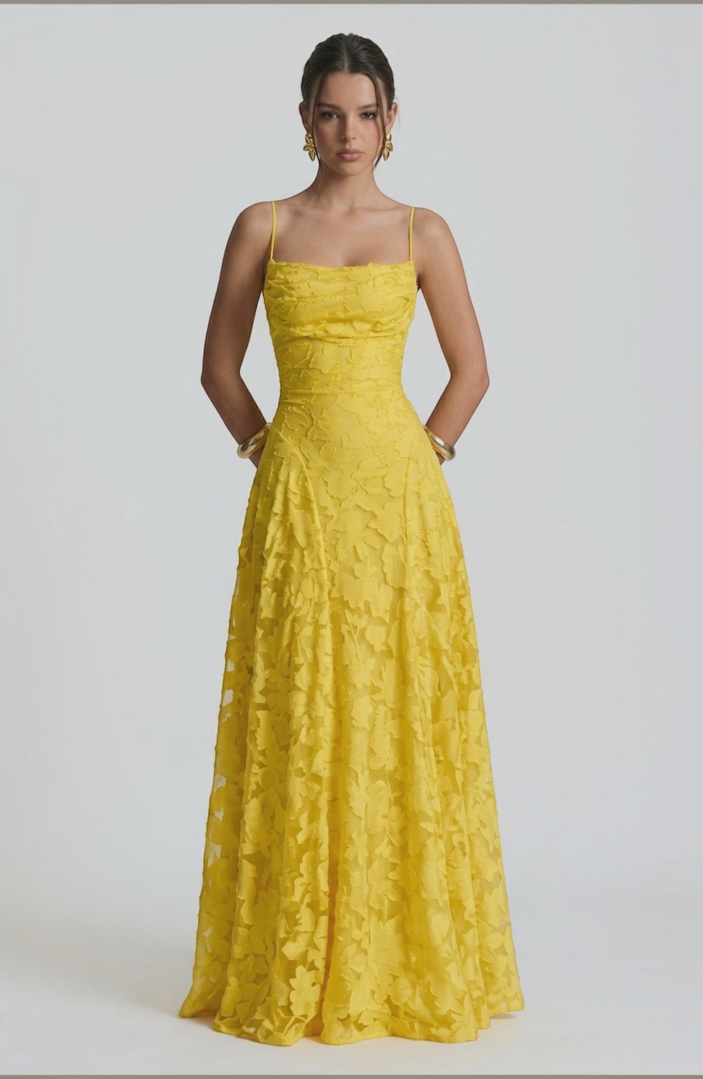 Elegant flowy bridal dress by LORVENES featuring a delicate, airy fabric and romantic silhouette for a wedding or special occasion.
