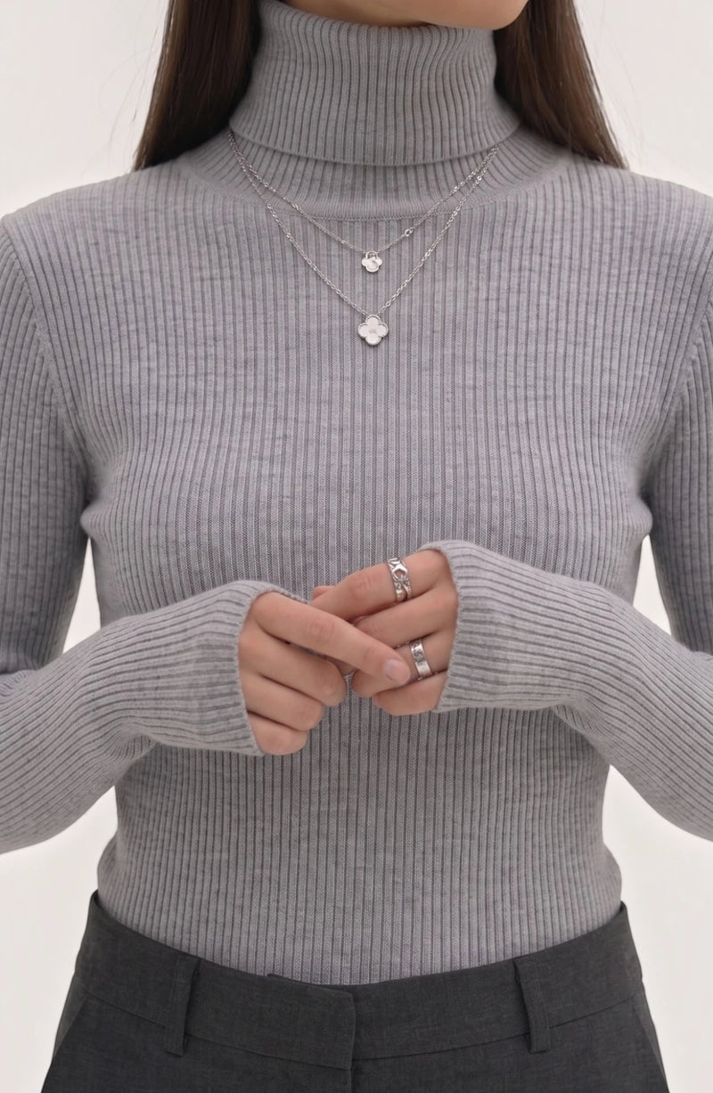 LORVENE Pure Soft Polyester High Neck in a smooth fabric with a fitted design, displayed in a close-up front view.
