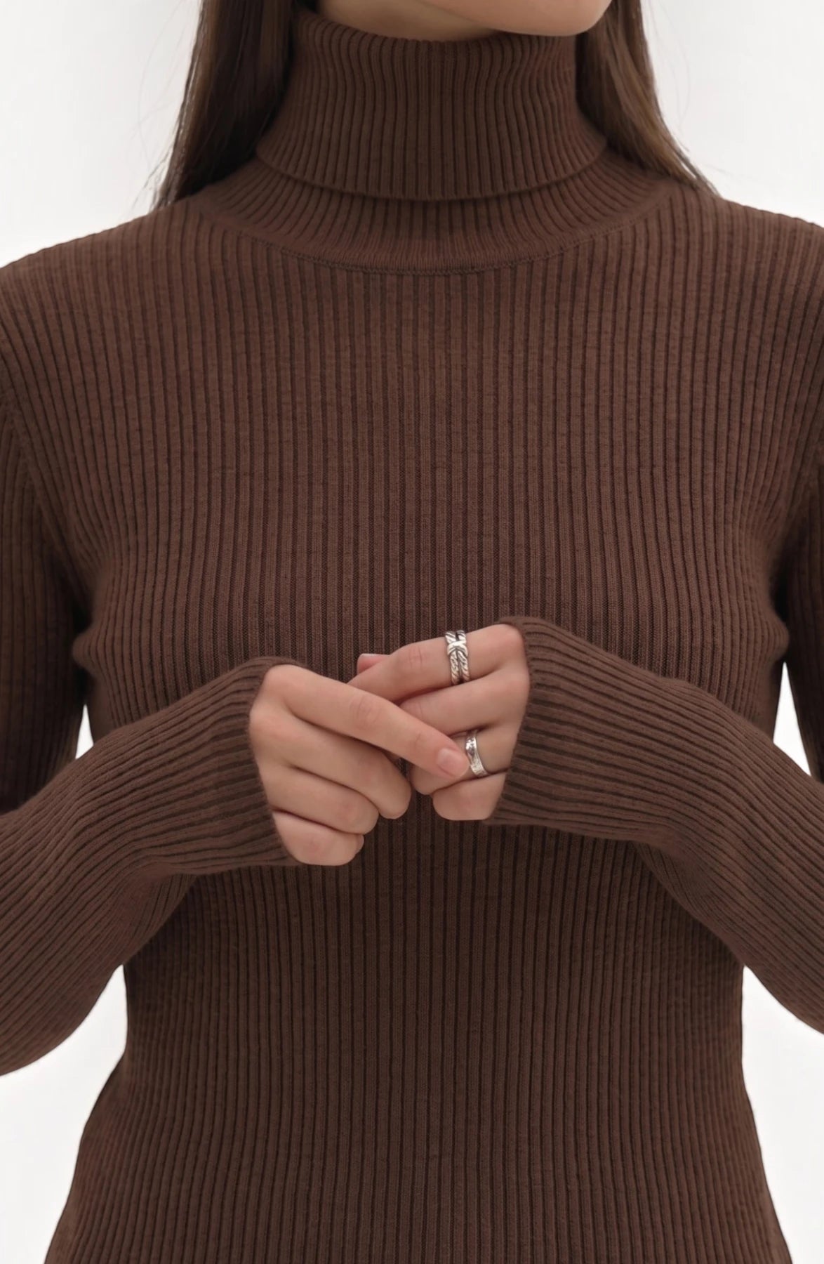 LORVENE pure soft polyester high neck top in light color, featuring a cozy high neckline and smooth fabric texture.