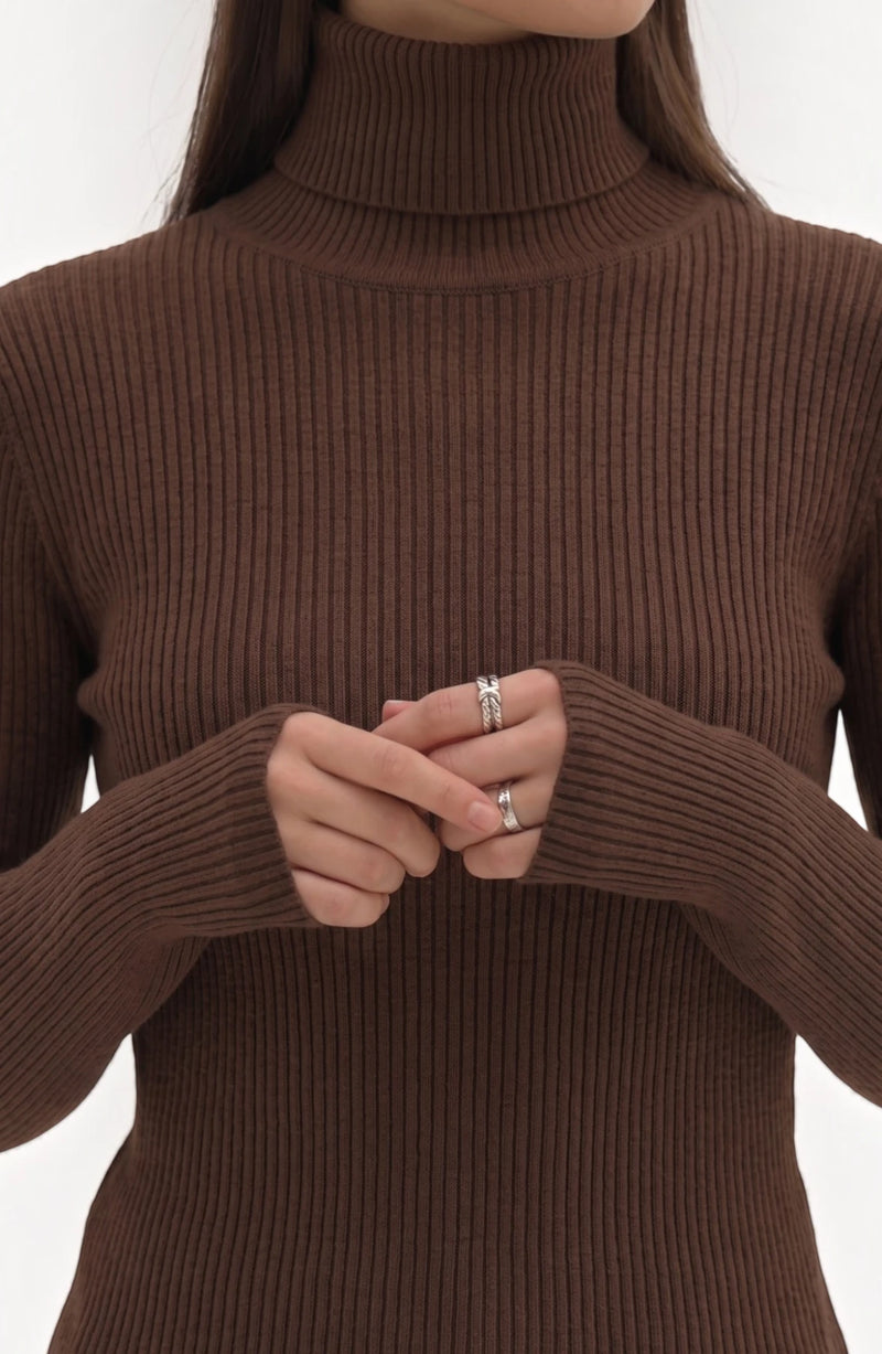 LORVENE pure soft polyester high neck top in light color, featuring a cozy high neckline and smooth fabric texture.