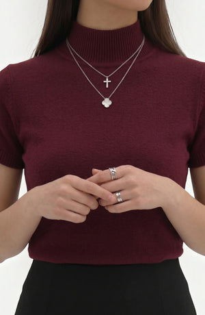LORVENE pure poly blend high neck top in neutral color, close-up showing fabric texture and high neckline style.