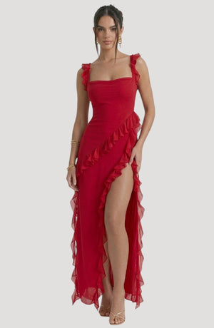 LORVENE Midnight Petal Maxi dress displayed on a model, featuring a flowing silhouette and elegant design in dark floral pattern.