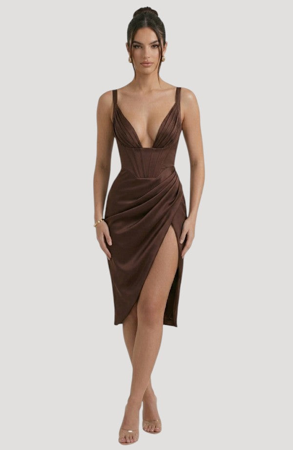 LORVENE Pearl Tulle Maxi dress with intricate pearl embellishments and flowing tulle fabric, shown from the top left angle.