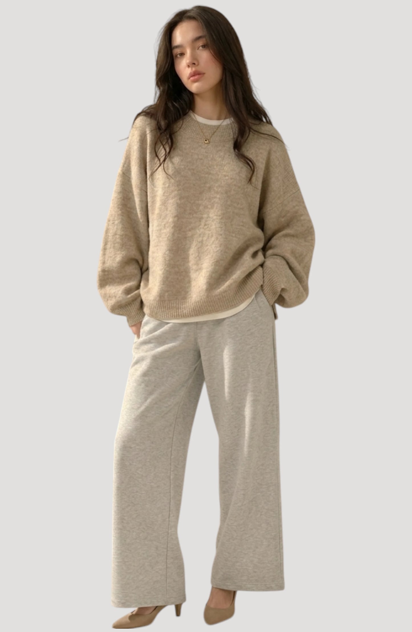 LORVENES oversized sweater in neutral color, featuring a relaxed fit and cozy knit texture, displayed on a hanger.