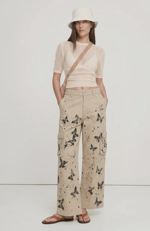 LORVENE Metro Curve Pants shown in a top-left pose, featuring a stylish fit and modern design in a contemporary fashion setting.