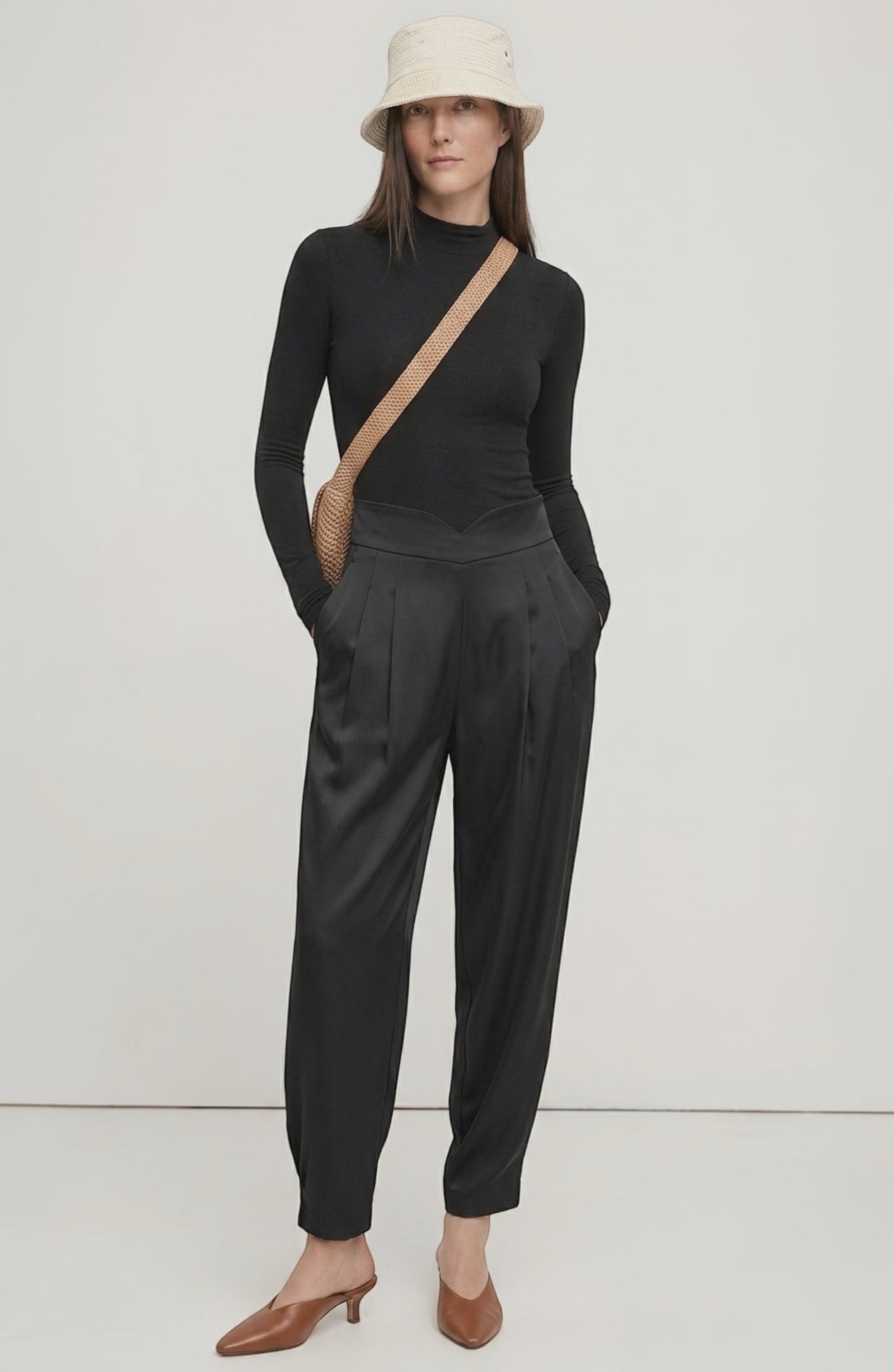 LORVENE Line Edge Pants displayed in a top-left pose, showing the sleek, tailored design and fabric texture.