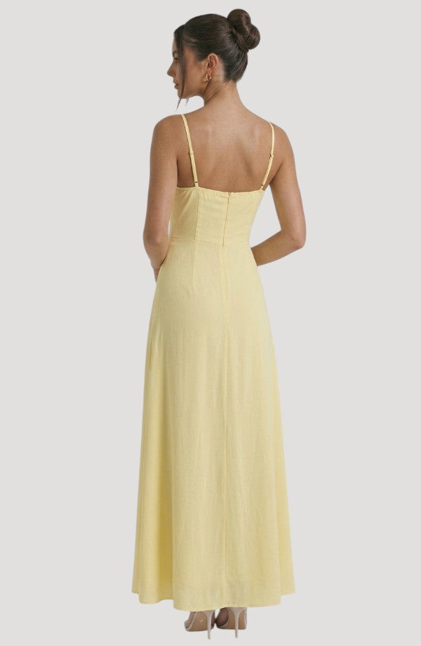 LORVENE Pure Ruffle Maxi dress in flowy fabric with ruffled top and elegant design, shown from the top right angle.