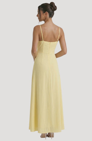 LORVENE Pure Ruffle Maxi dress in flowy fabric with ruffled top and elegant design, shown from the top right angle.