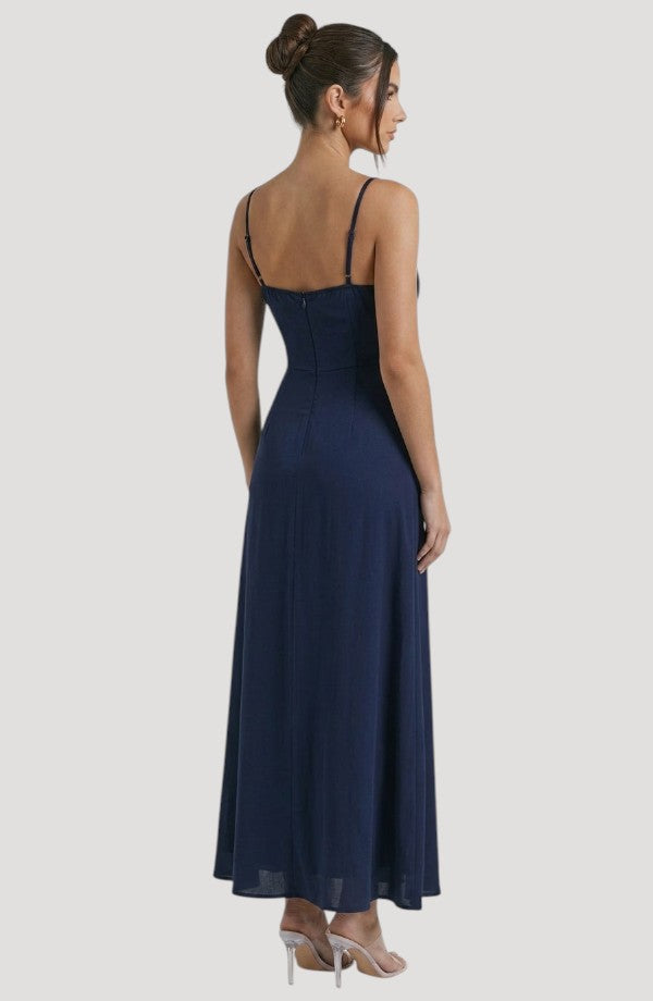 Elegant white ruffle maxi dress by LORVENE featuring a flowy silhouette and intricate ruffle details.