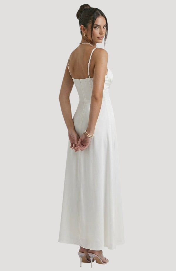 LORVENE Pure Ruffle Maxi dress with a high neckline and flowing fabric, shown from the top right angle.