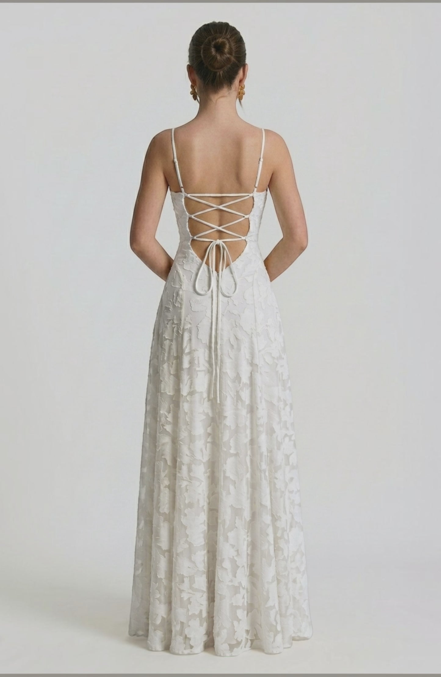 LORVENES sexy flowy bridal dress worn by model, featuring elegant fabric and a flowing silhouette for a wedding or special occasion.