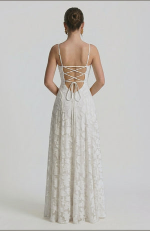 LORVENES sexy flowy bridal dress worn by model, featuring elegant fabric and a flowing silhouette for a wedding or special occasion.