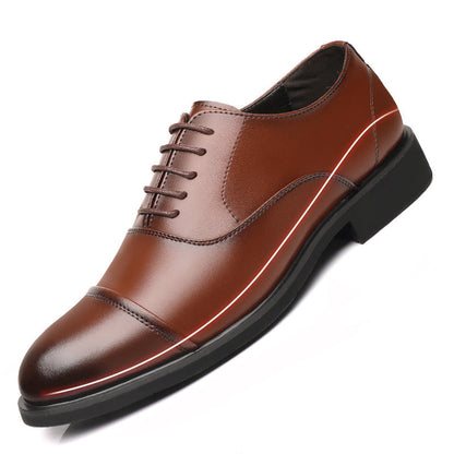 Brown dress shoe with black sole on a white background