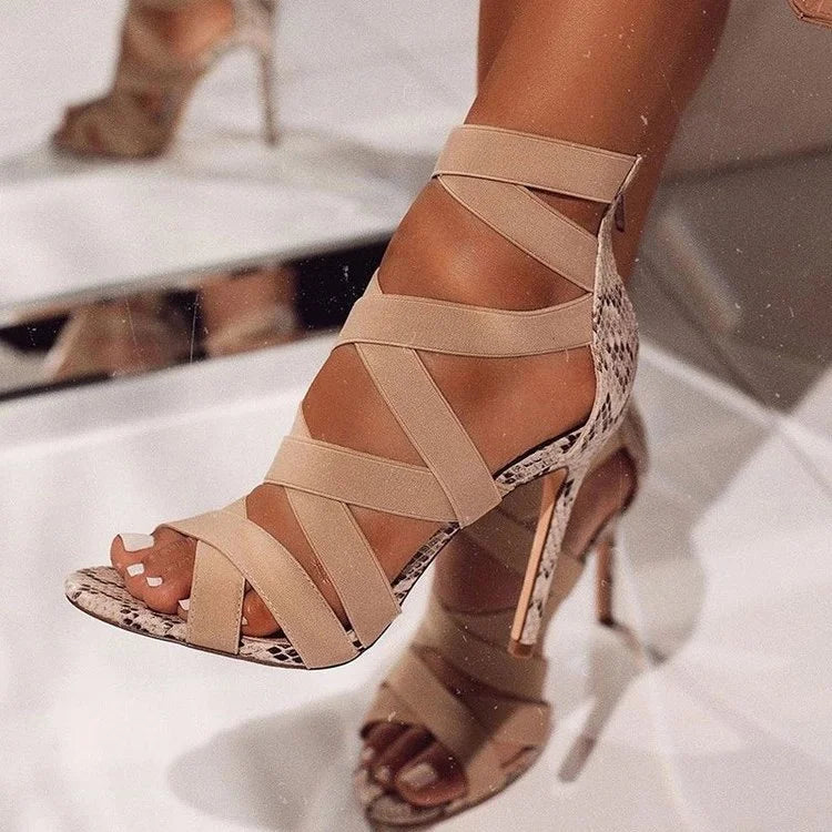 LORVENE crystal curve heels featuring elegant design with sparkling crystal accents and sleek high heel silhouette.