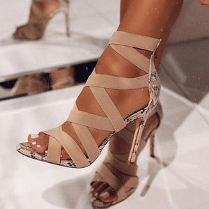 LORVENE crystal curve heels featuring elegant design with sparkling crystal accents and sleek high heel silhouette.