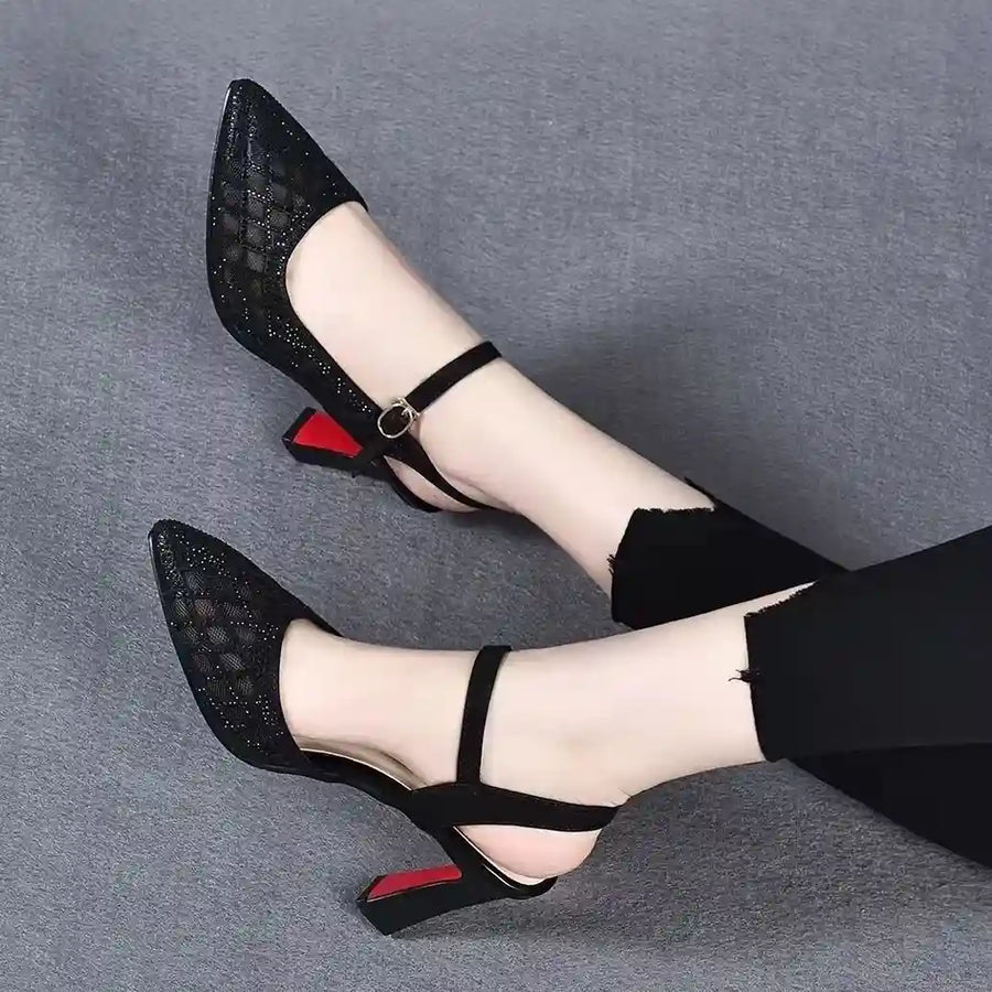 LORVENE Femme Aura heels with sleek black design and pointed toe, displayed on a white background.