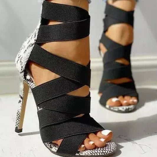 LORVENE Crystal Curve Heels featuring a sleek design with sparkling embellishments and a pointed toe for elegant style.