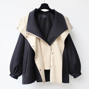 LORVENE Soft Signature Jacket in neutral fabric, featuring a relaxed fit and classic collar, displayed on a hanger.