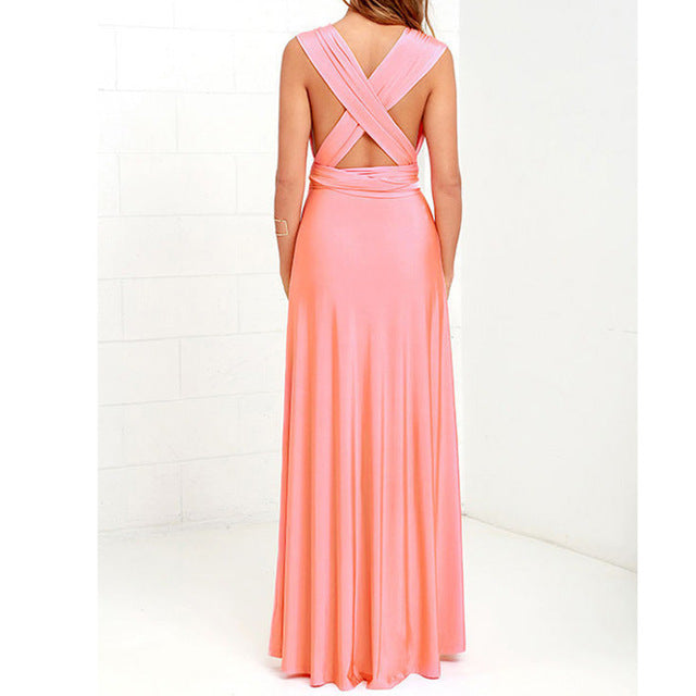 LORVENES backless halter maxi dress with flowing fabric and open back, perfect for elegant summer occasions.
