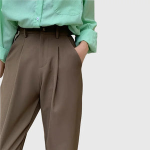 LORVENE City Luxe Pants displayed on a model, showcasing stylish tailored fit and modern design in neutral fabric.