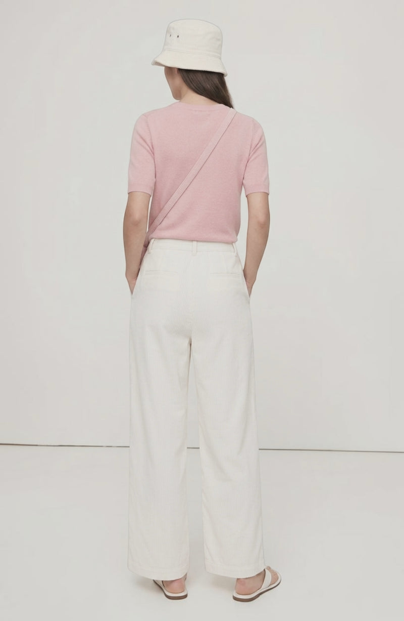 LORVENE Sleek Ease Pants shown from a top-right angle, highlighting the modern fit and smooth fabric in a stylish pose.