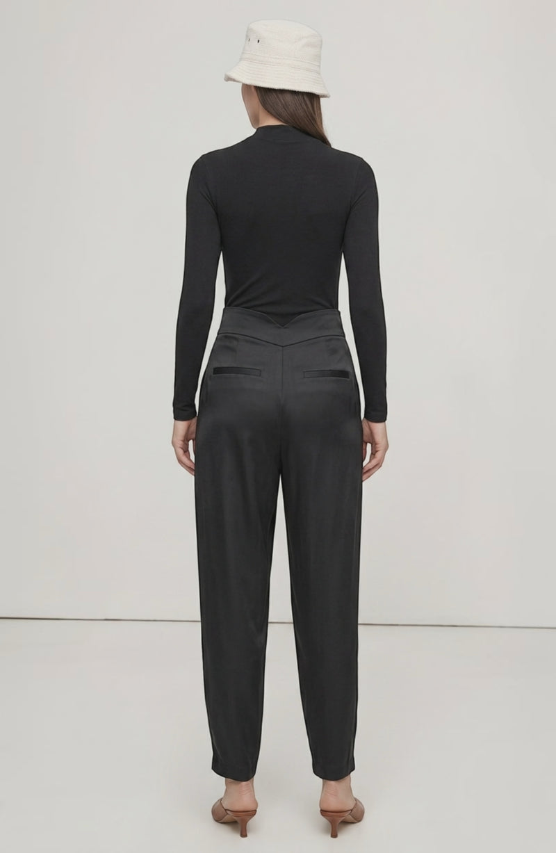 LORVENE Line Edge Pants shown from a top right angle, featuring sleek design and tailored fit in a neutral color.