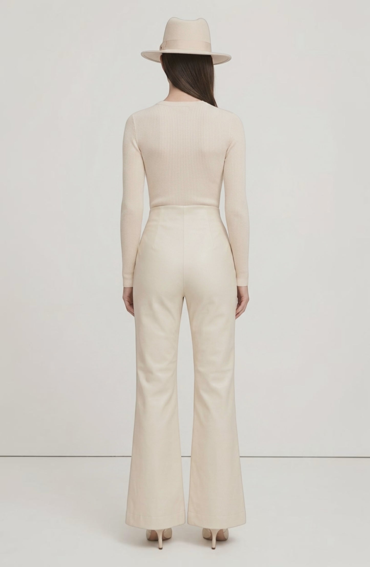 LORVENE Line Mode Pants displayed from a top-right pose, showcasing the sleek fit and stylish design of the pants.