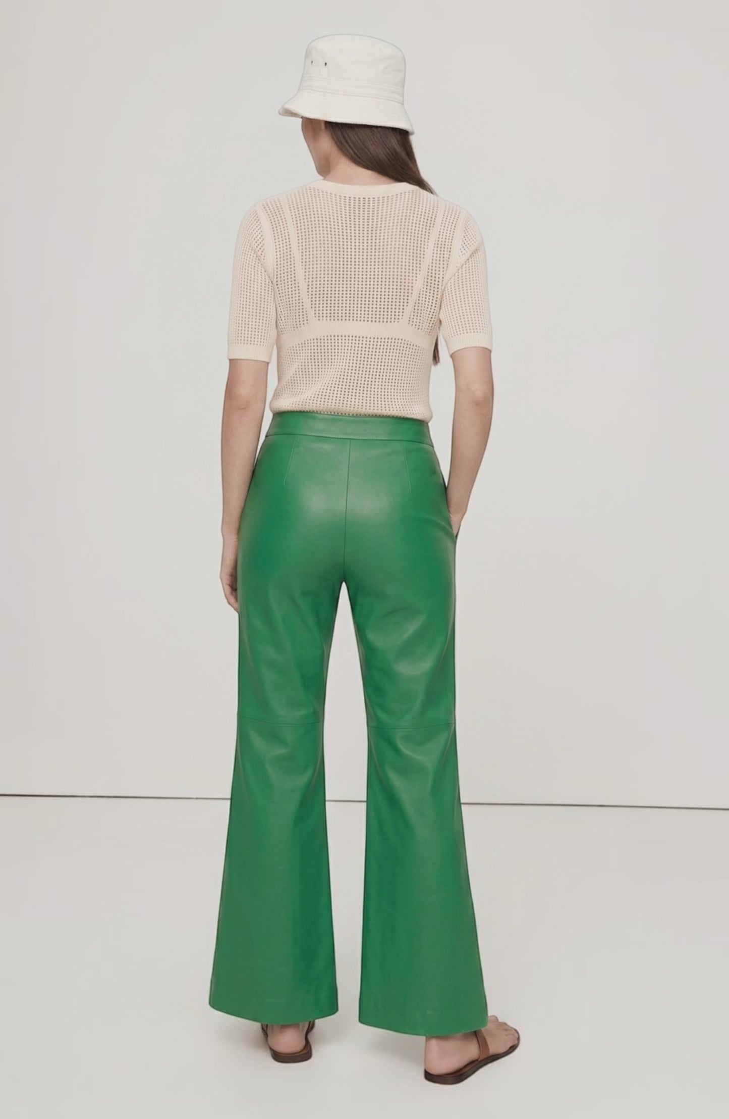 LORVENE Line Mode Pants in a top-right pose, showcasing slim fit and sleek design in a neutral fabric.