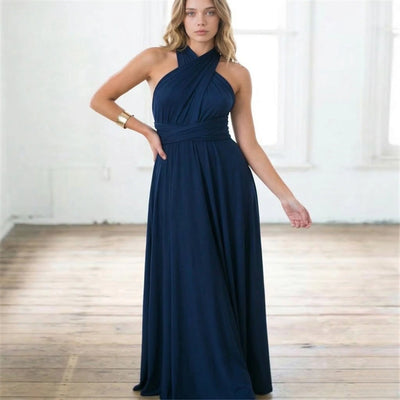 LORVENES backless halter maxi dress with flowing fabric and deep neckline, perfect for elegant summer events.