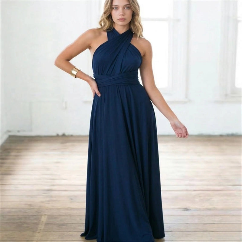 LORVENES backless halter maxi dress with flowing fabric and deep neckline, perfect for elegant summer events.
