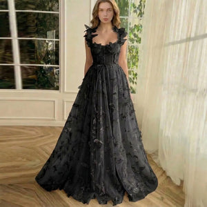 LORVENES elegant sleeveless maxi dress in flowing fabric with a fitted waist and floor-length skirt.