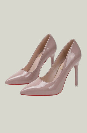 Elegant beige Pure Essence heels by LORVENES featuring a pointed toe and sleek stiletto heel on a neutral background. (600x920)