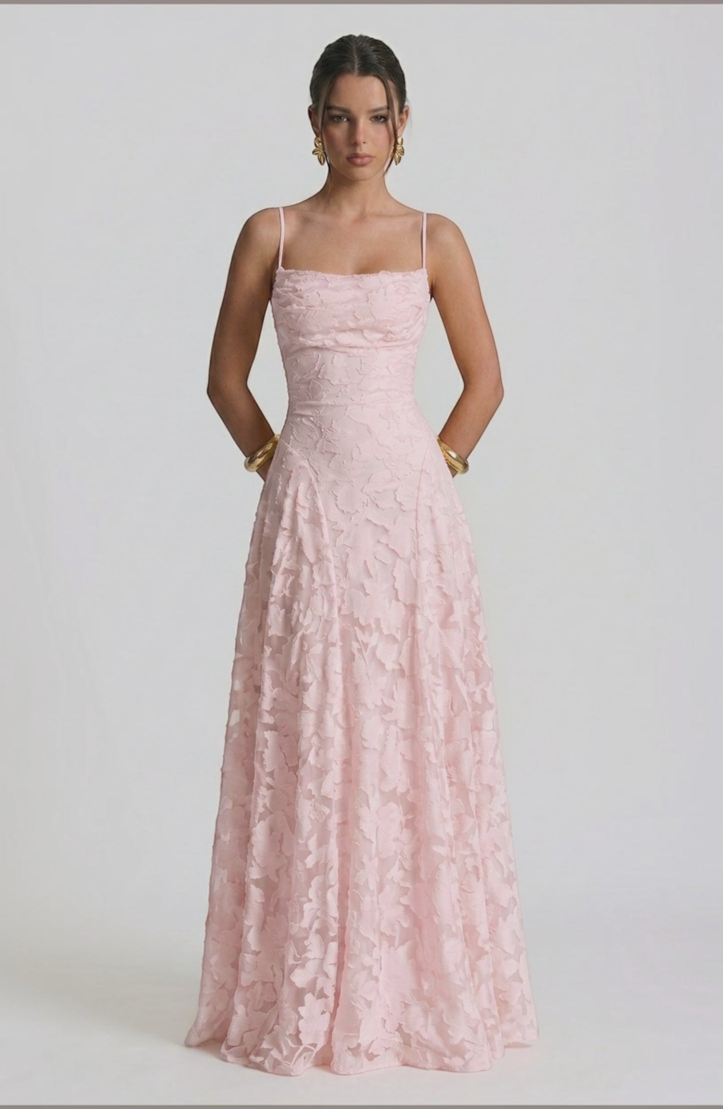 LORVENES sexy flowy bridal dress in soft fabric with elegant draping, perfect for a romantic wedding look.
