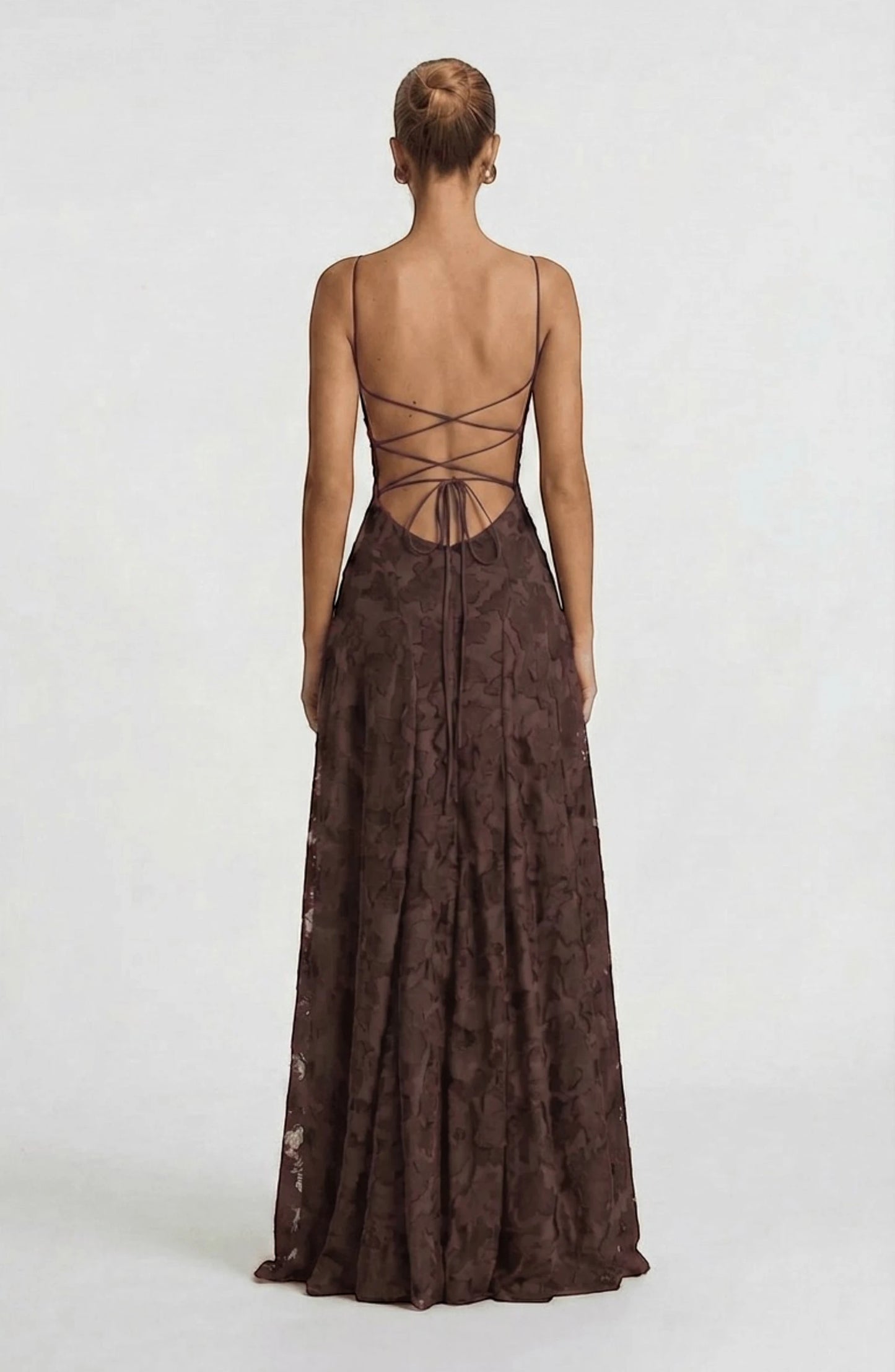 Elegant flowy bridal dress by LORVENES featuring delicate fabric and a graceful silhouette for a romantic wedding look.
