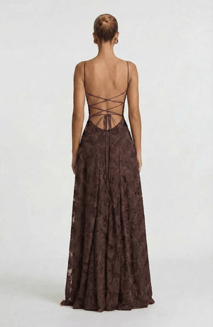 Elegant flowy bridal dress by LORVENES featuring delicate fabric and a graceful silhouette for a romantic wedding look.