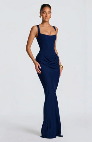 LORVENES halter bodycon maxi dress in vibrant color, fitted design with a high neckline, showcased on a model.